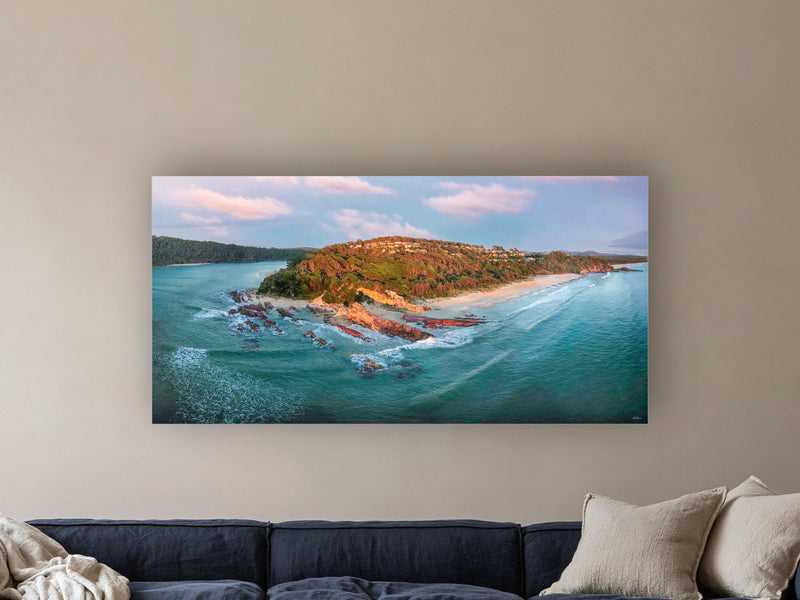 Pambula River Mouth panorama in acrylic above a navy linen sofa
