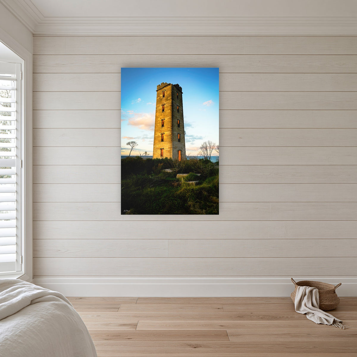 Ben Boyd Tower acrylic panel wall art in a coastal bedroom