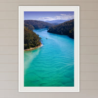 Pambula River Safe Shelter framed print in white with a mat, in a coastal lounge room