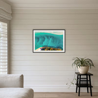 Pambula River Bird's Eye View framed print in black with a white mat, above a sofa