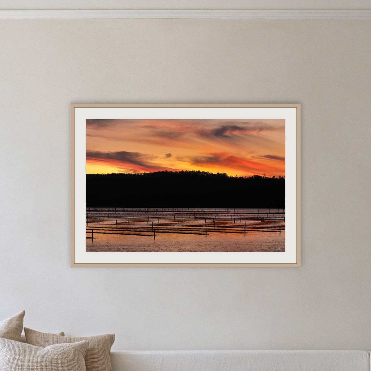 Top Lake Oyster Leases at Sunset framed print in oak with a white mat, on a coastal lounge room wall