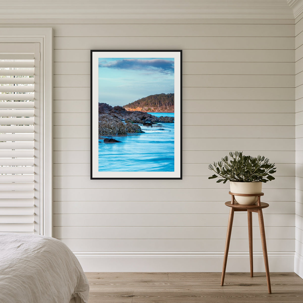 Pambula River Oyster Leases framed print in black with a white mat, in a coastal bedroom