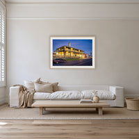 Tathra Hotel framed print in oak with a white mat, on a coastal lounge room wall