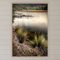 Yowaka River in an oak frame without a mat, above the bed in a white coastal bedroom
