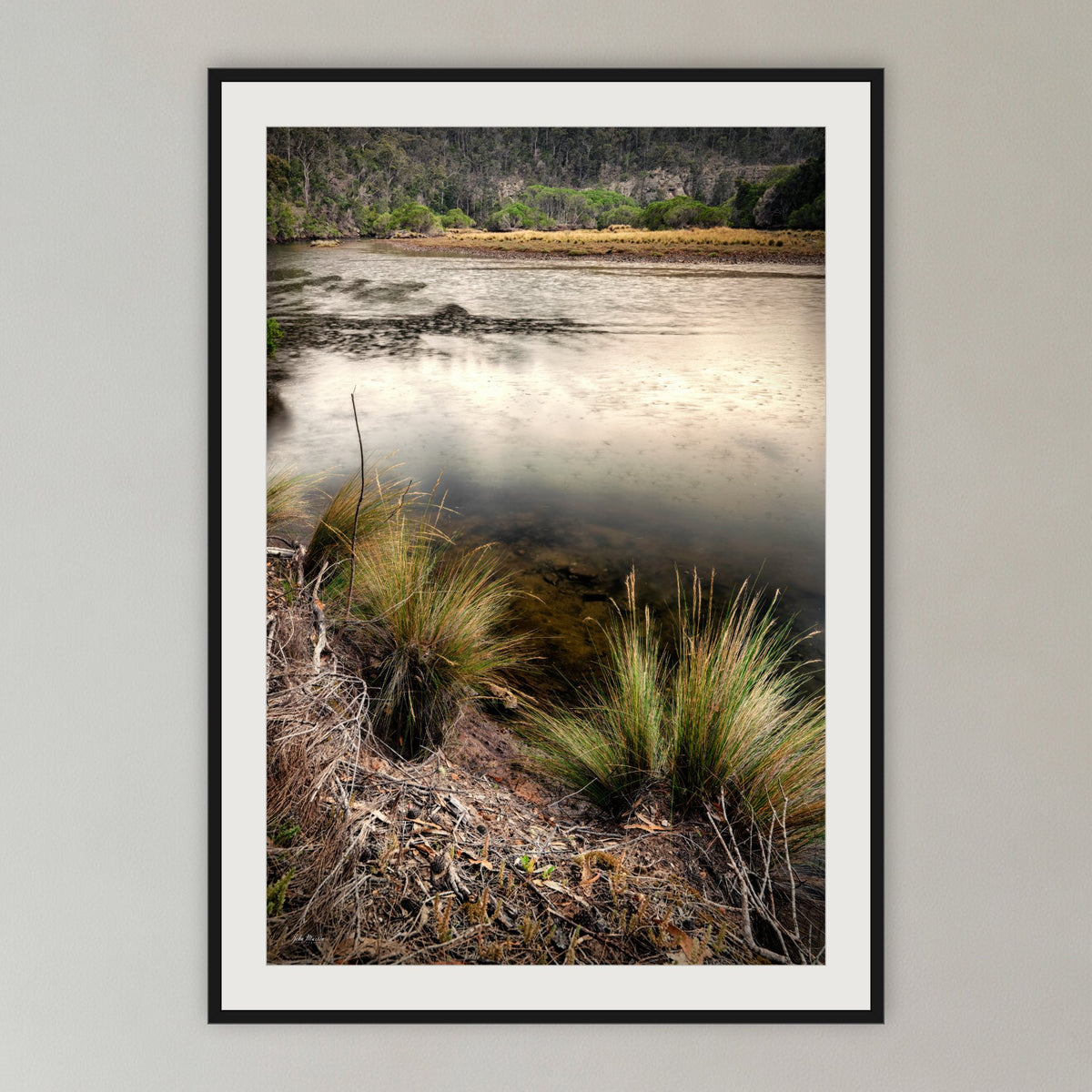 Yowaka River framed print in black with a white mat, in a cane-panelled hallway