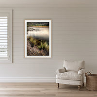 Yowaka River framed print in oak with a white mat, on a coastal lounge room wall