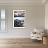 Tathra Wharf Smooth Seas framed print in oak with a white mat, in a coastal lounge room