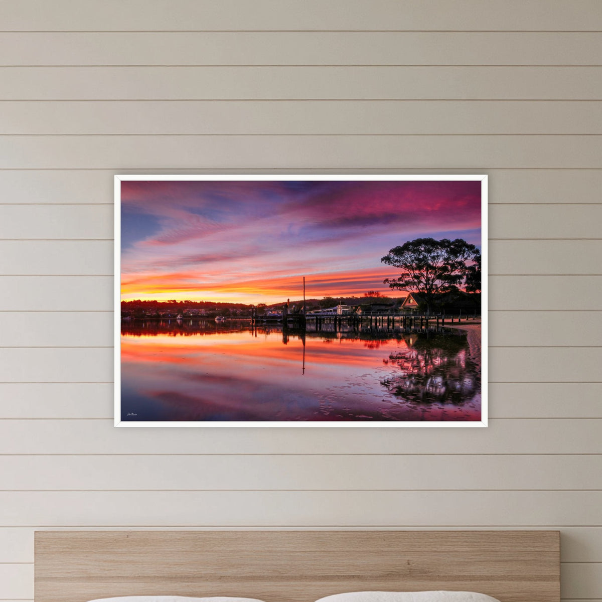 Spencer Park in a white frame without a mat, in a bedroom