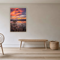 Top Lake Mangrove in an oak frame without a mat, in a cane-panelled hallway