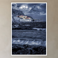 Merimbula Wharf B&W with Colour in a white frame without a mat, in a plaster-walled hallway