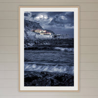 Merimbula Wharf B&W with Colour framed print in oak with a white mat, in a coastal lounge room