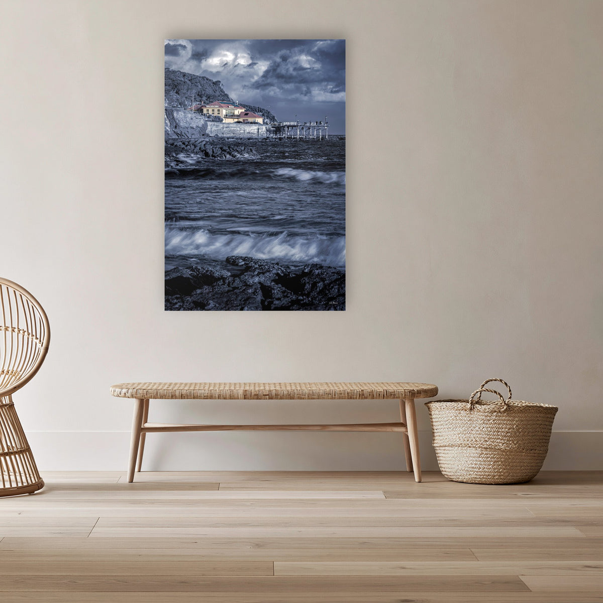 Merimbula Wharf B&W with Colour acrylic panel wall art in a cane-panelled hallway