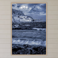 Merimbula Wharf in an oak frame without a mat, above the bed in a white coastal bedroom
