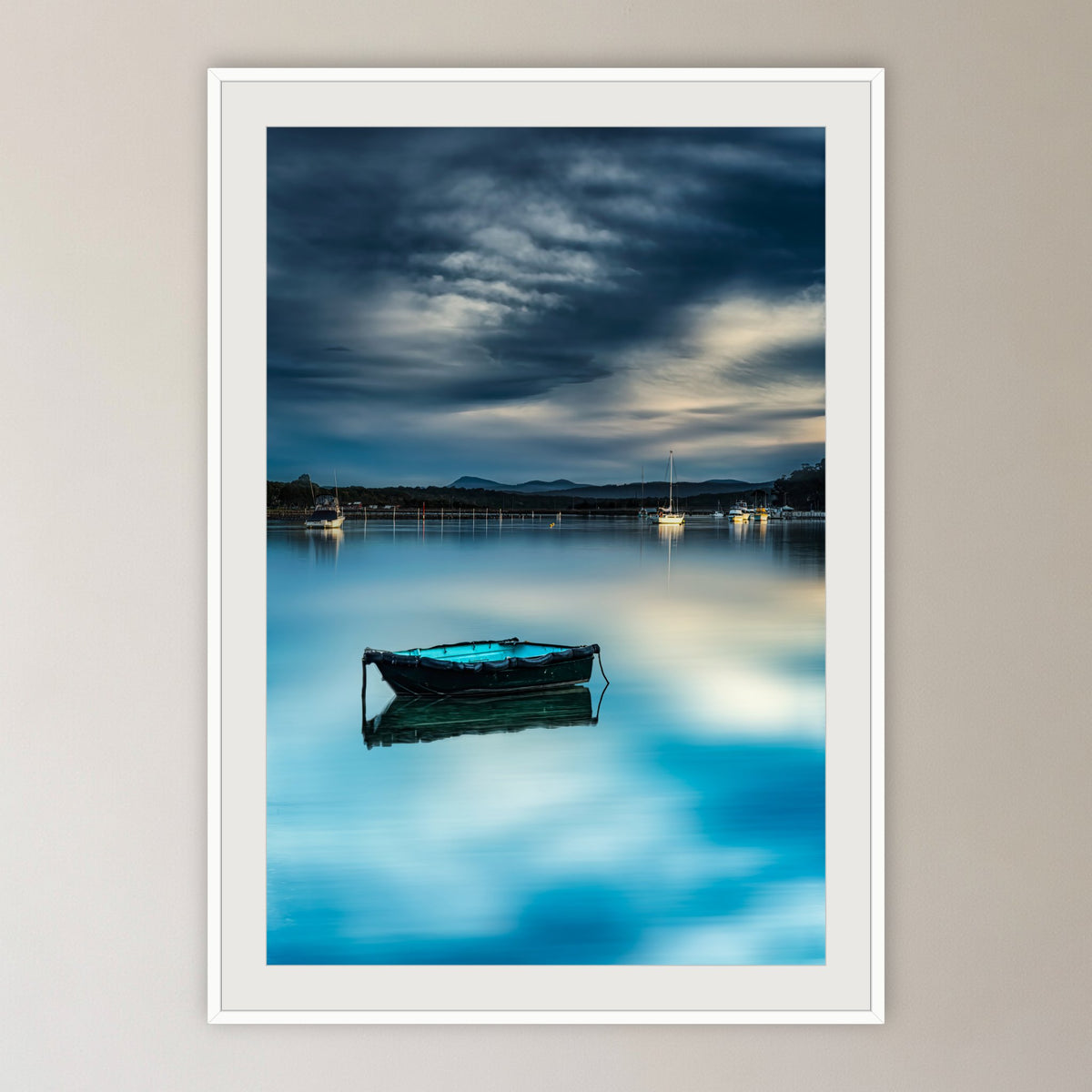 Little Boat Artistic Treatment framed print in white with a mat, in a cane-panelled hallway
