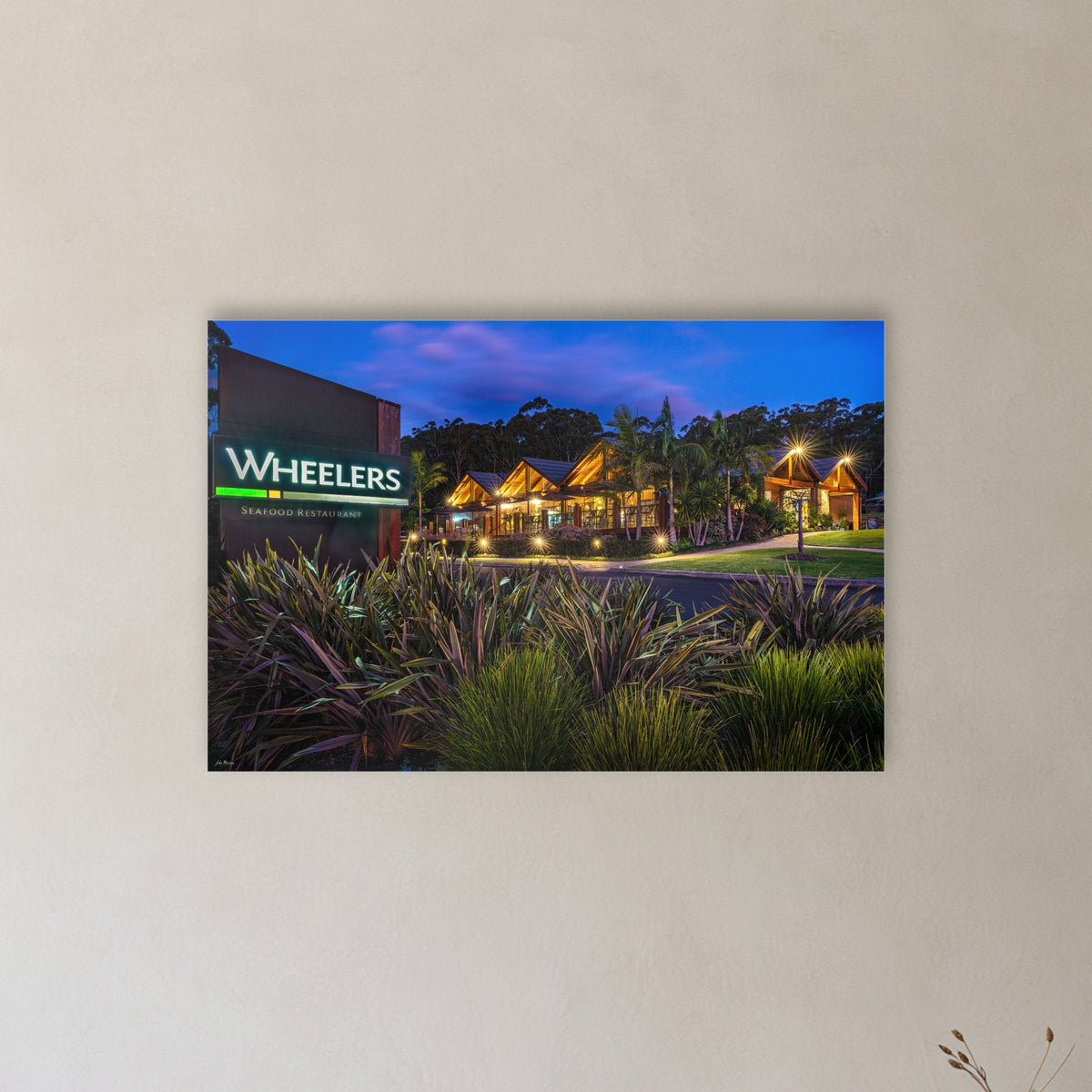 Wheelers Restaurant acrylic panel wall art in a hallway