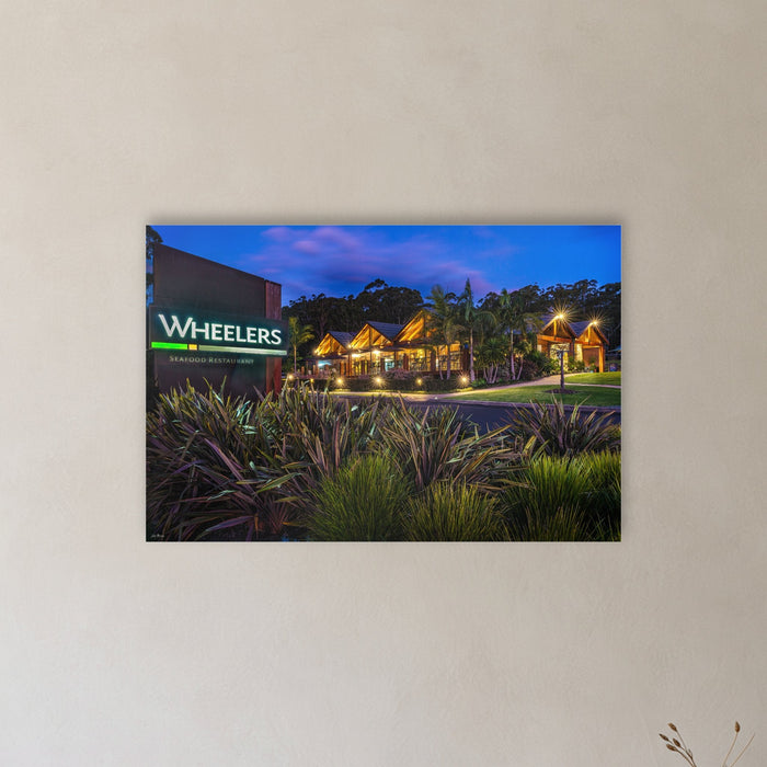 Wheelers Restaurant acrylic panel wall art in a hallway