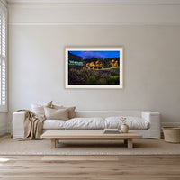 Wheelers Restaurant framed print in oak with a white mat, on a coastal lounge room wall