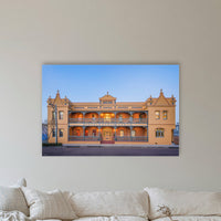 Hotel Australasia acrylic panel wall art in a coastal lounge room