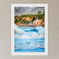 Tathra Wharf and Waves framed print in white with a mat, in a coastal lounge room