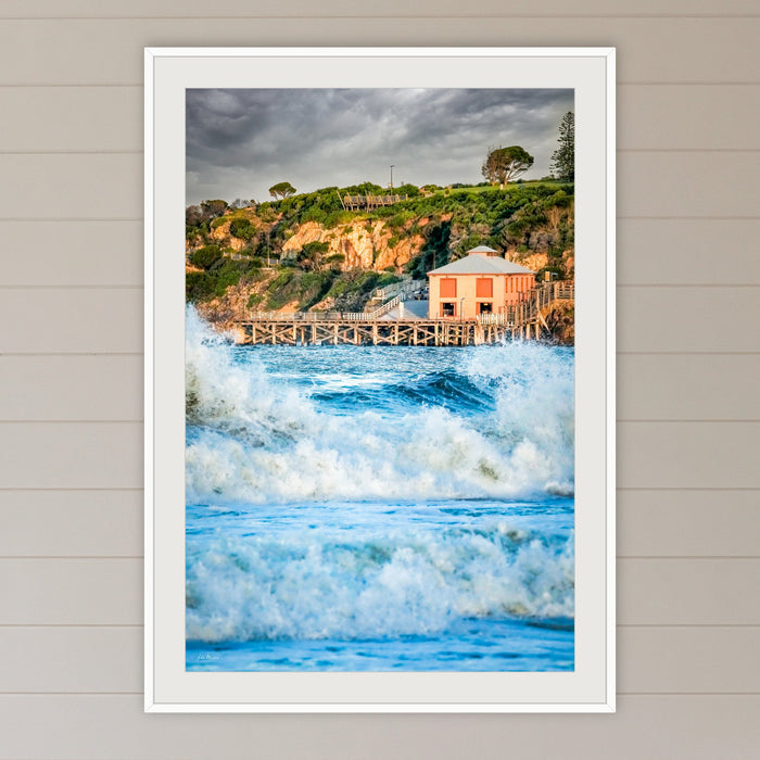 Tathra Wharf and Waves framed print in white with a mat, in a coastal lounge room