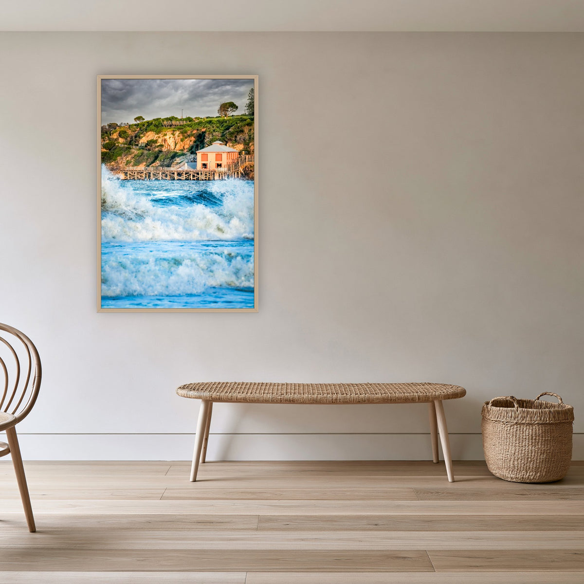Tathra Wharf and Waves in an oak frame without a mat, in a cane-panelled hallway