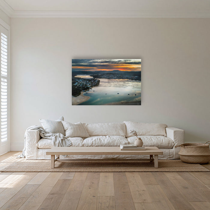 Merimbula Eagle Eye Sunset acrylic panel wall art in a coastal lounge room