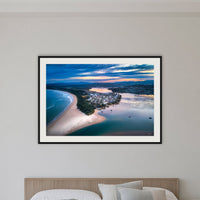 Fishpen on Dusk framed print in black with a white mat, in a bedroom