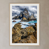 Camel Rock framed print in oak with a white mat, in a plaster-walled hallway