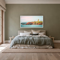 Ben Boyd Tower from the Sea wide panorama in a white frame above a linen bed on a sage wall — wall art, Eden NSW