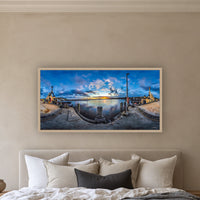 Sunset over Twofold Bay wide panorama in an oak frame above a linen bed — wall art, Eden NSW