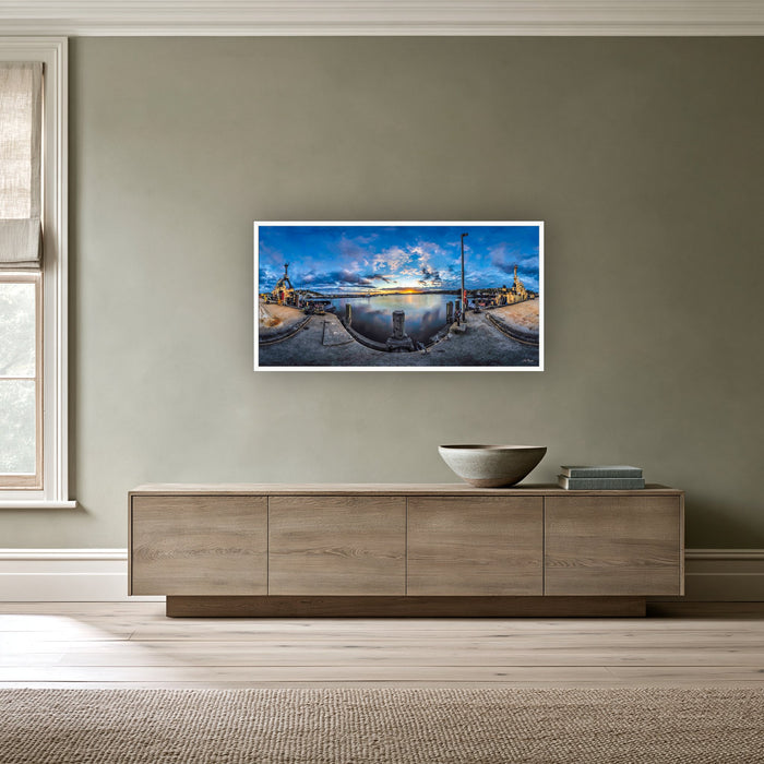 Sunset over Twofold Bay wide panorama in a white frame above a long oak sideboard — wall art, Eden NSW
