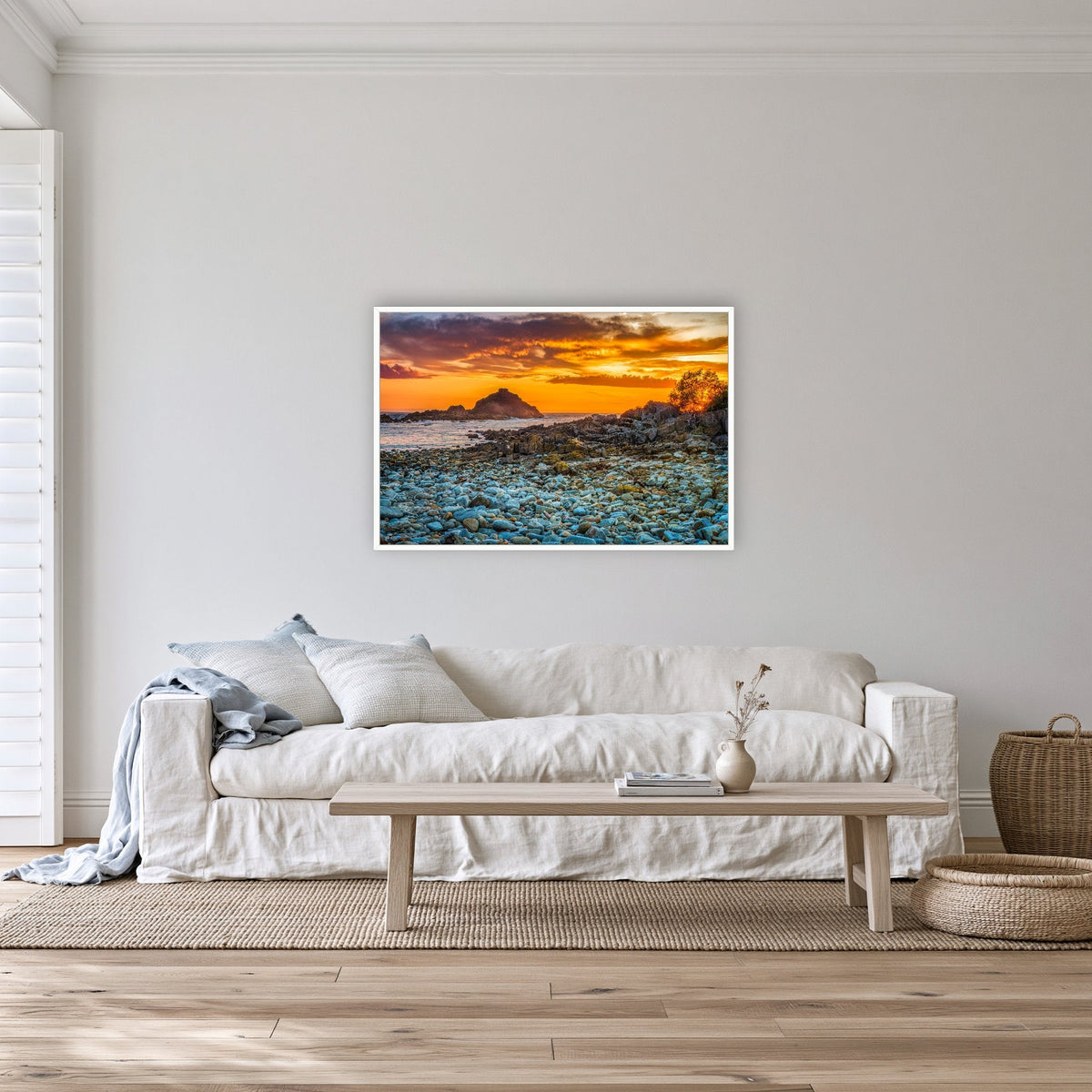 Mimosa Rocks Sunrise in a white frame without a mat, on a lounge room wall