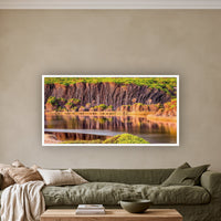 Bournda Lagoon wide panorama in a white frame above an olive linen sofa — wall art, Sapphire Coast NSW