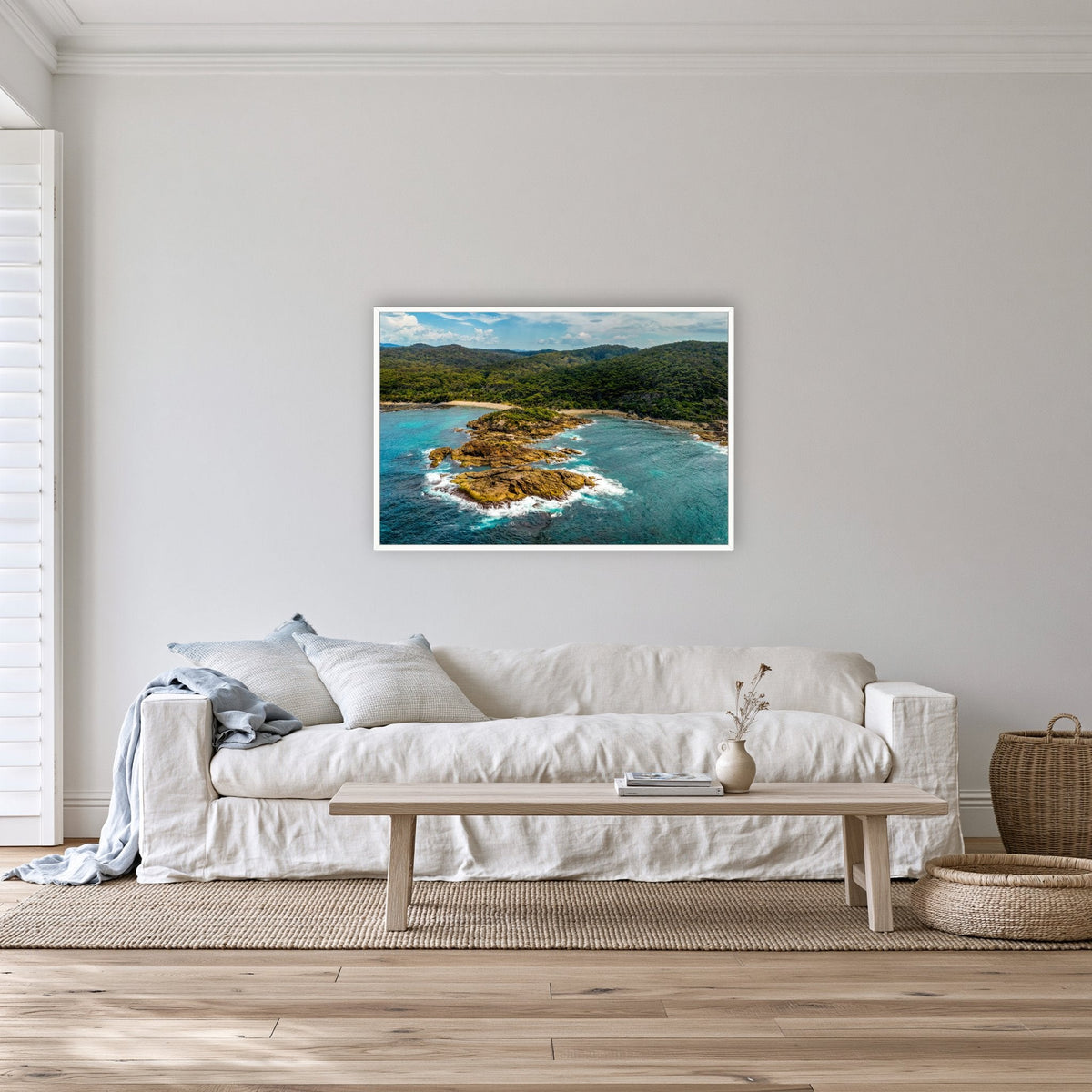 Mimosa Rocks in a white frame without a mat, on a lounge room wall