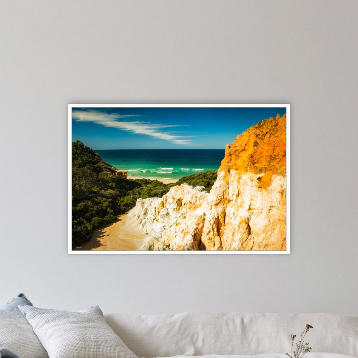 The Pinnacles in a white frame without a mat, on a lounge room wall
