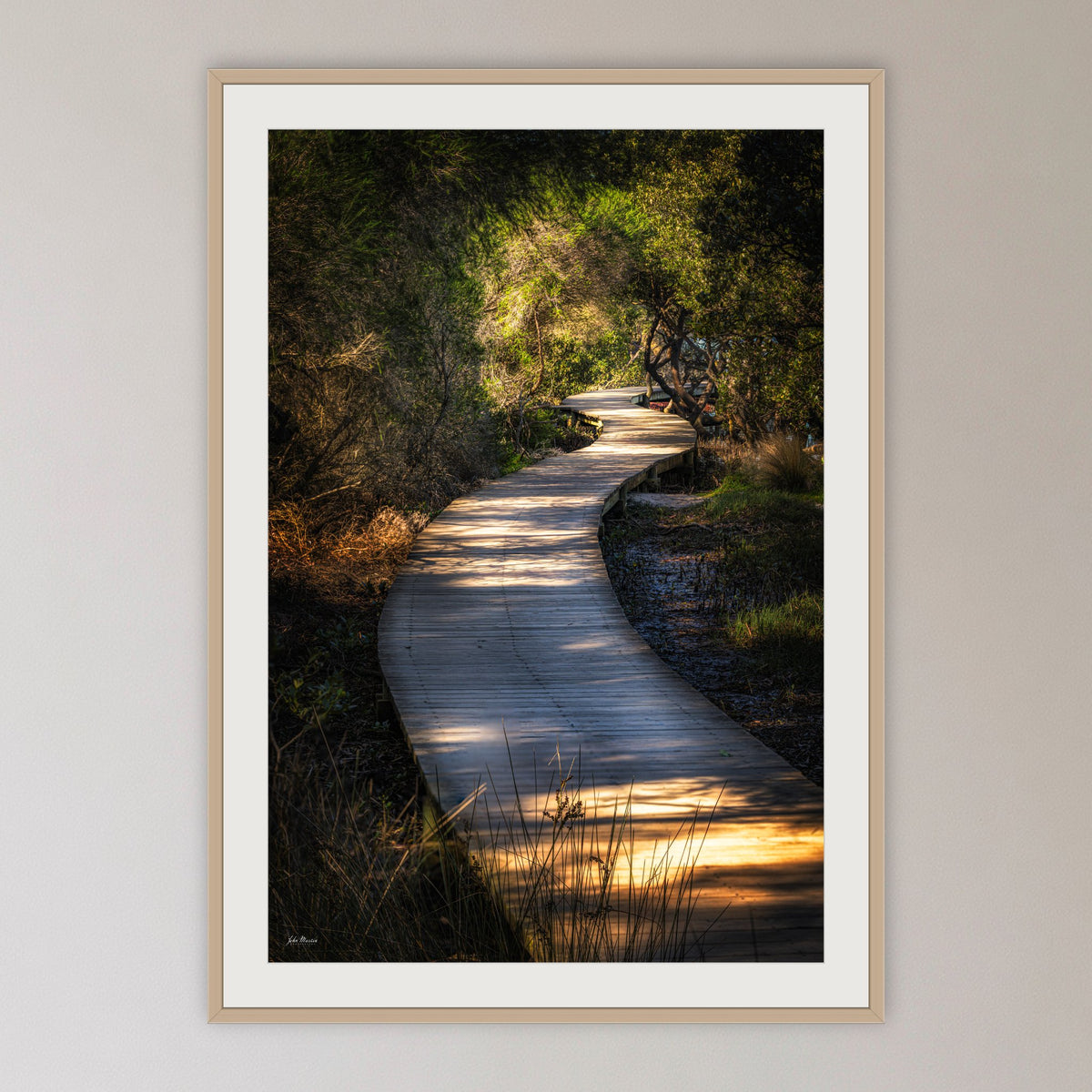 Merimbula Boardwalk — Two framed print in oak with a white mat, in a cane-panelled hallway