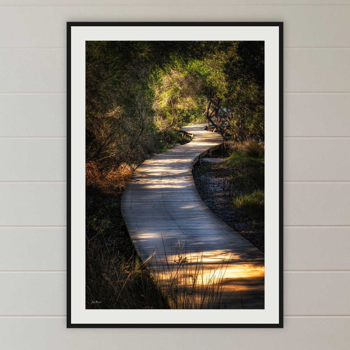 Merimbula Boardwalk — Two framed print in black with a white mat, in a shiplap hallway