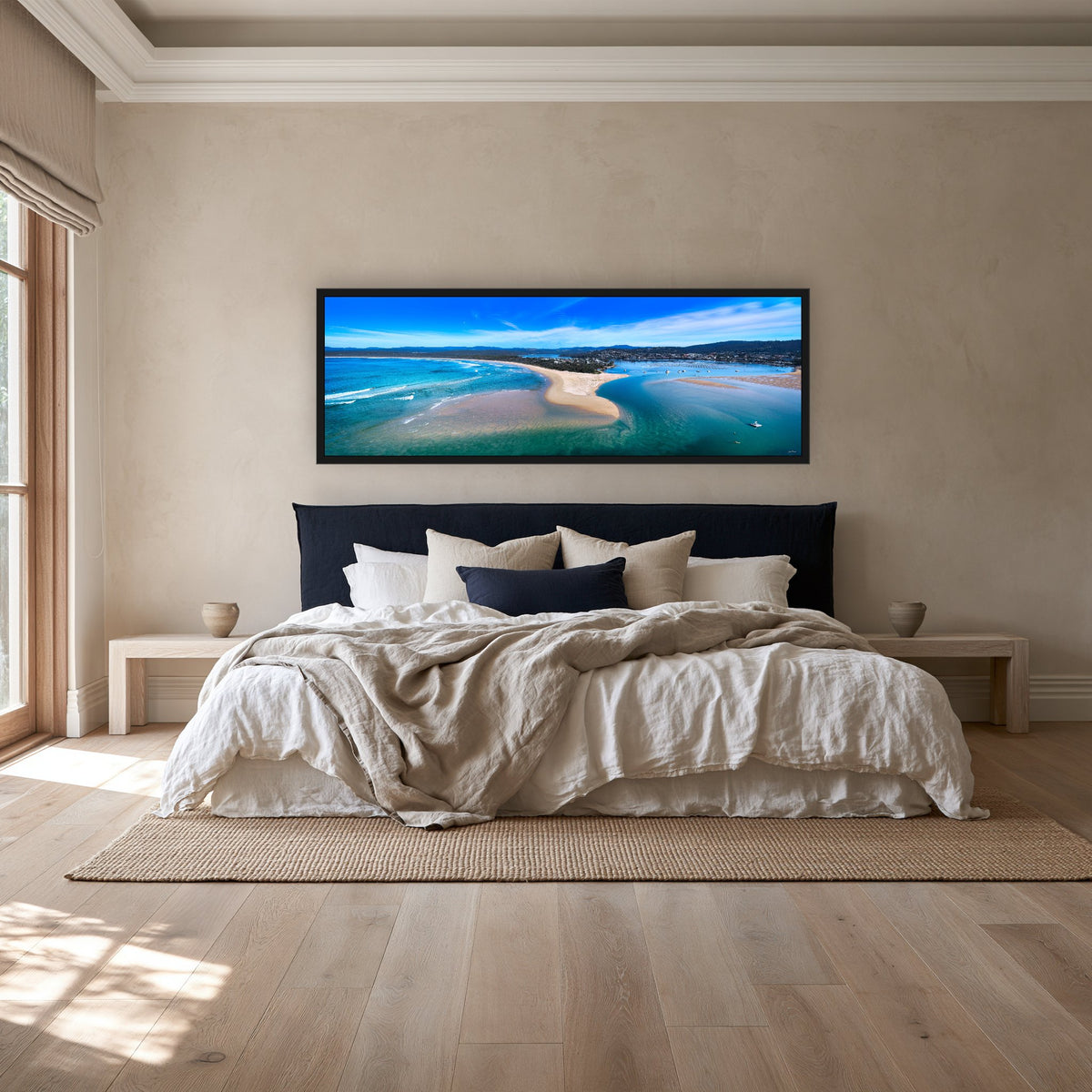 Merimbula Lake super wide panorama in a black frame above a navy bedhead — wall art, Sapphire Coast NSW