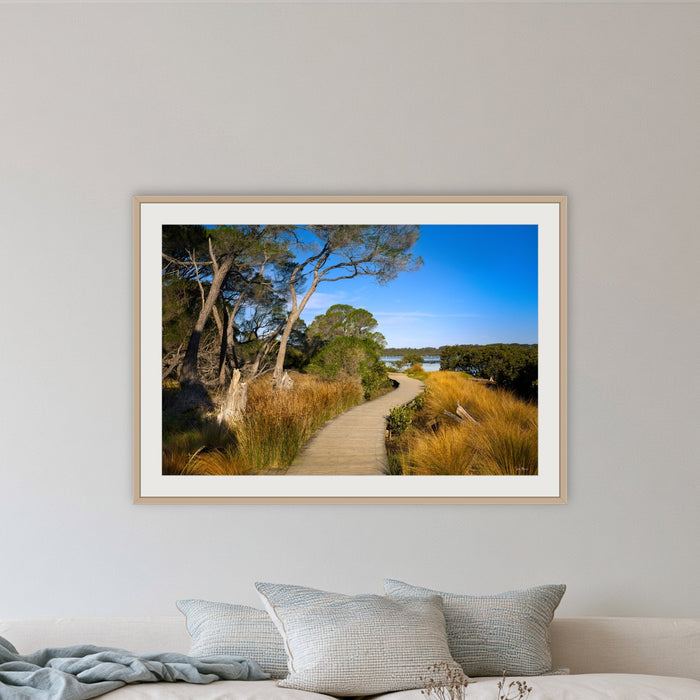 Merimbula Boardwalk — Five framed print in oak with a white mat, in a lounge room
