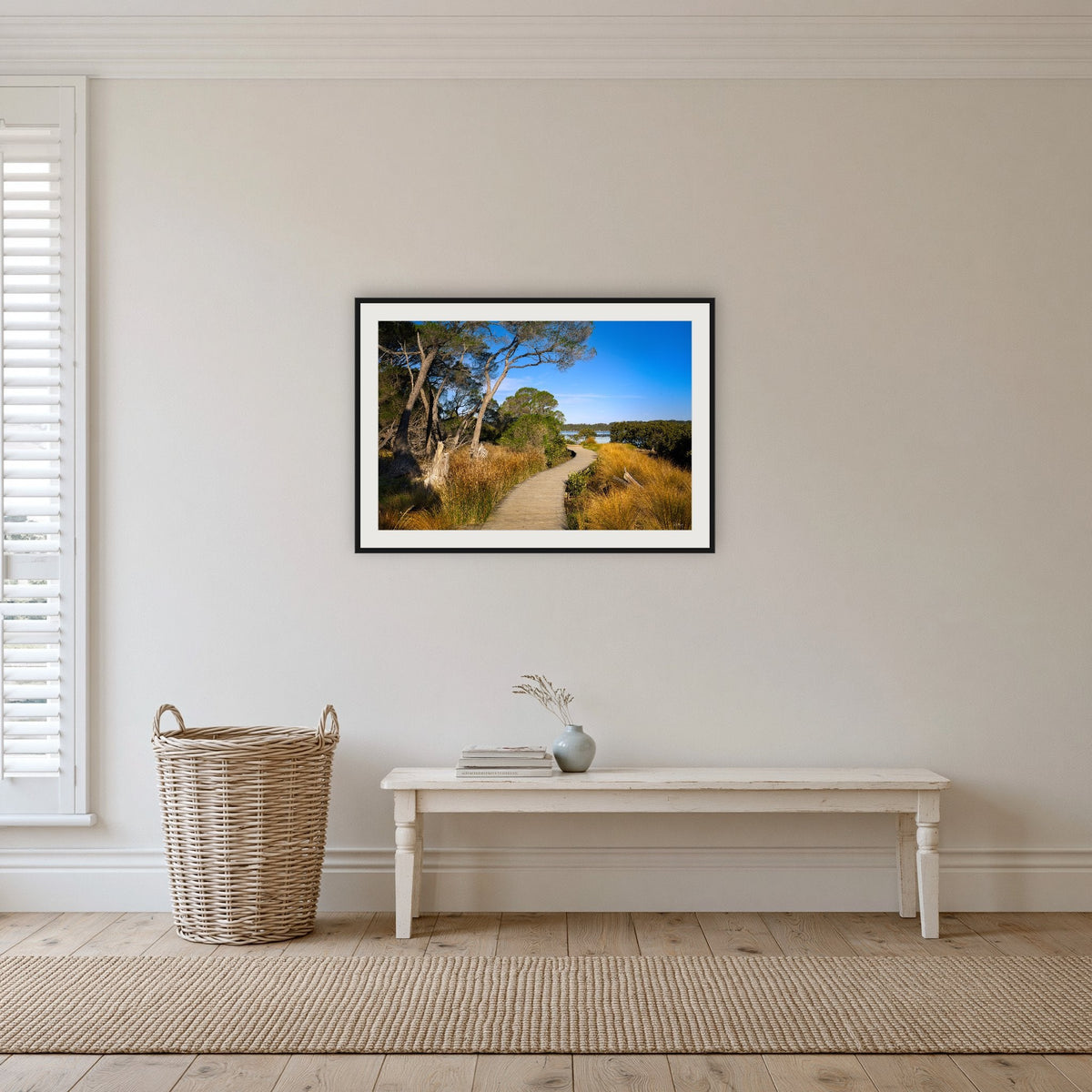 Merimbula Boardwalk — Five framed print in black with a white mat, in a hallway