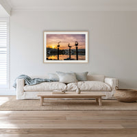 Pelican Sculptures framed print in oak with a white mat, in a lounge room