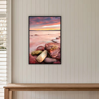 Sunset from Merimbula Wharf in a black frame without a mat, on a panelled hallway wall