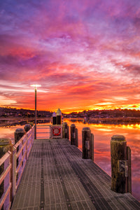 Winter sunrise over Merimbula Lake from the marina jetty — fine art print