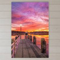 Sunrise over Merimbula Lake acrylic panel wall art in a coastal bedroom