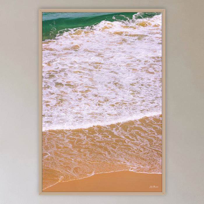 Tura Headlands in an oak frame without a mat, in a cane-panelled hallway