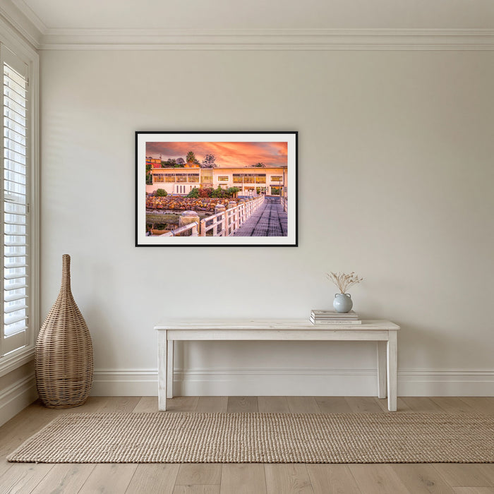 Lakeview Hotel framed print in black with a white mat, in a hallway