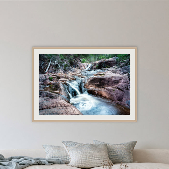 Biamanga Cultural Area framed print in oak with a white mat, in a lounge room