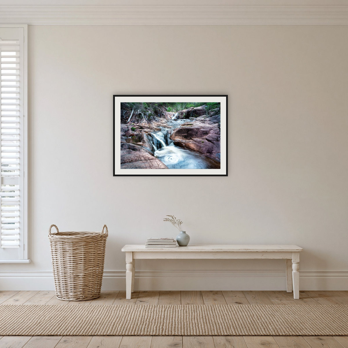 Biamanga Cultural Area framed print in black with a white mat, in a hallway