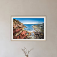 North Head Worang Point framed print in oak with a white mat, in a hallway