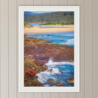 Short Point framed print in white with a mat, on a panelled hallway wall